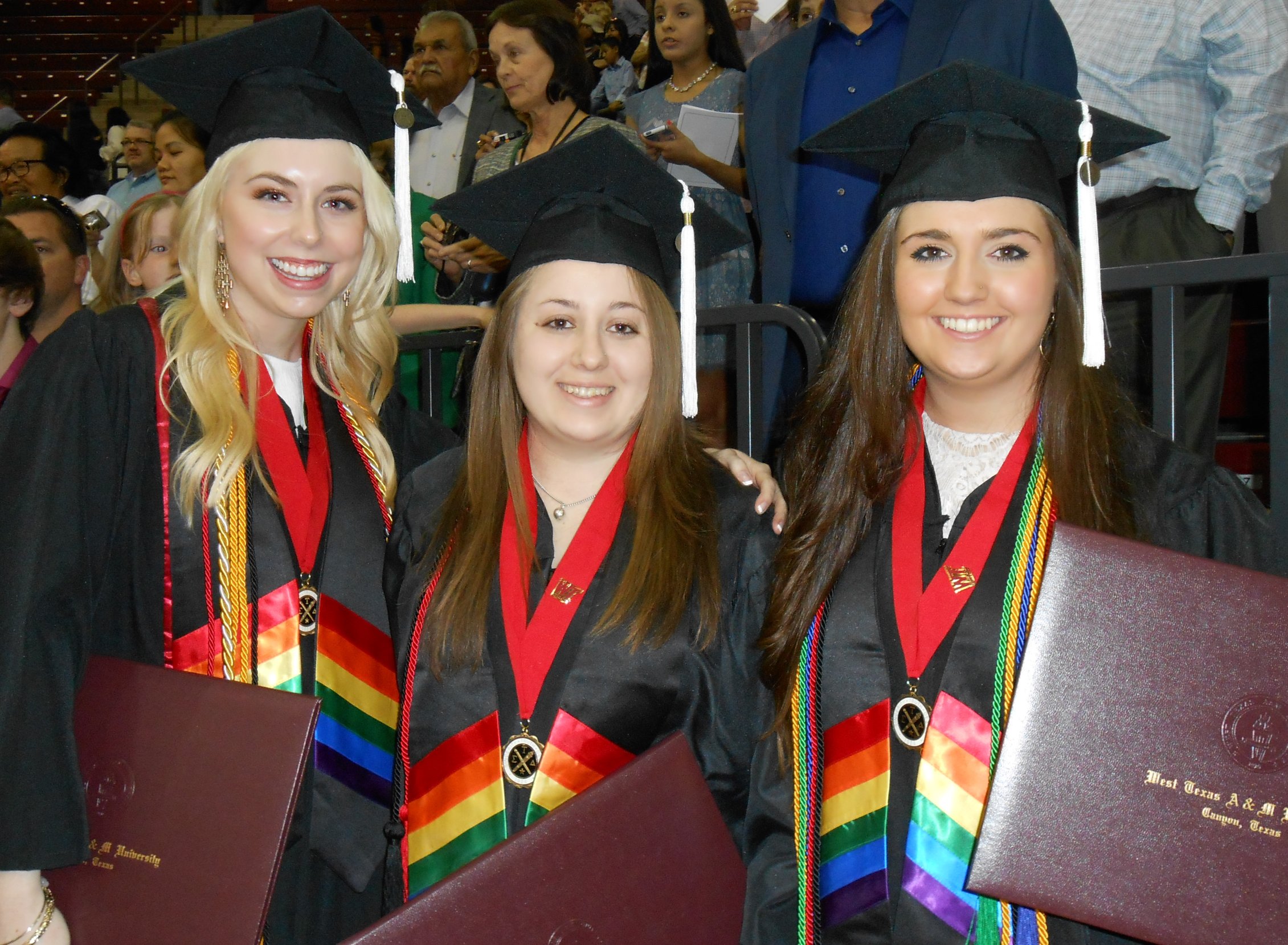 English student graduates wearing rainbow stoles, May 2015